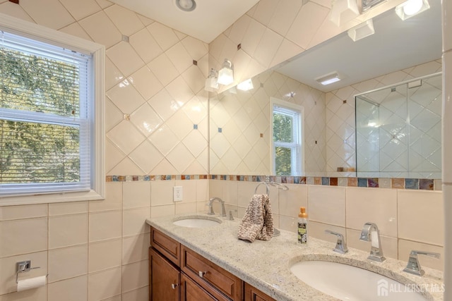 17 SE Candle Ln, East Brunswick, NJ 08816 - full bathroom featuring a sink, tile walls, a tile shower, and double vanity