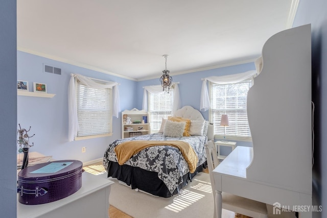 17 SE Candle Ln, East Brunswick, NJ 08816 - bedroom with baseboards, visible vents, ornamental molding, and wood finished floors