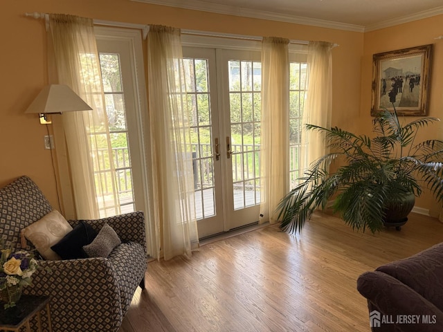 17 SE Candle Ln, East Brunswick, NJ 08816 - doorway to outside with crown molding, french doors, and wood finished floors