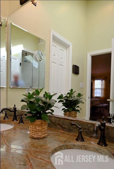 17 SE Candle Ln, East Brunswick, NJ 08816 - full bathroom featuring a towering ceiling, a walk in shower, and vanity