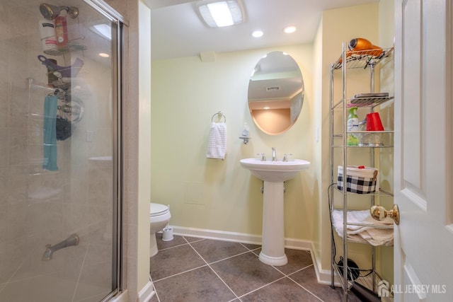 17 SE Candle Ln, East Brunswick, NJ 08816 - bathroom featuring tile patterned floors, baseboards, a shower stall, and toilet