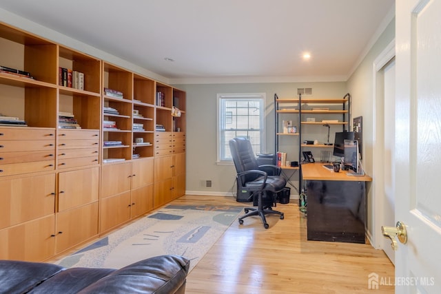 17 SE Candle Ln, East Brunswick, NJ 08816 - home office with visible vents, baseboards, ornamental molding, recessed lighting, and light wood-style flooring
