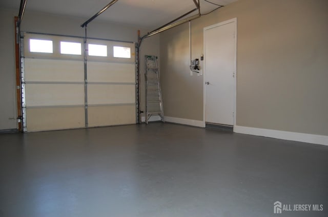 garage with baseboards