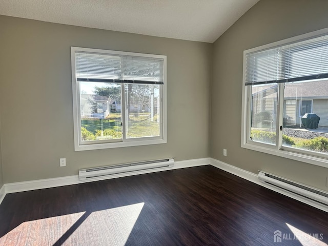 empty room with a baseboard heating unit, lofted ceiling, dark wood-type flooring, and baseboards