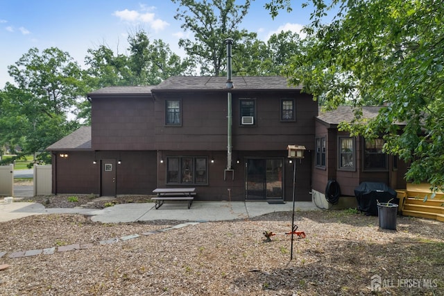 2 Kerry Ct, Old Bridge, NJ 08857 - back of house featuring a shingled roof and a patio area