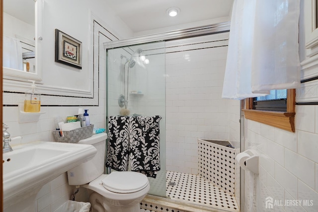 2 Kerry Ct, Old Bridge, NJ 08857 - bathroom featuring tiled shower and tile walls