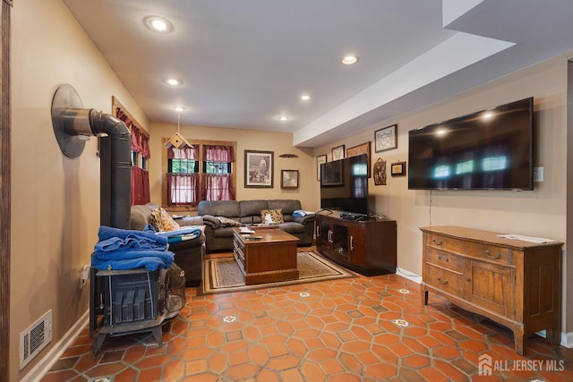 2 Kerry Ct, Old Bridge, NJ 08857 - living room featuring recessed lighting and a wood stove