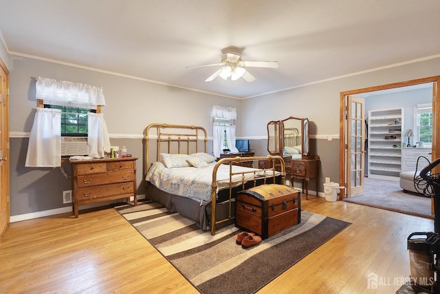 2 Kerry Ct, Old Bridge, NJ 08857 - bedroom with light wood finished floors, crown molding, a ceiling fan, and a walk in closet