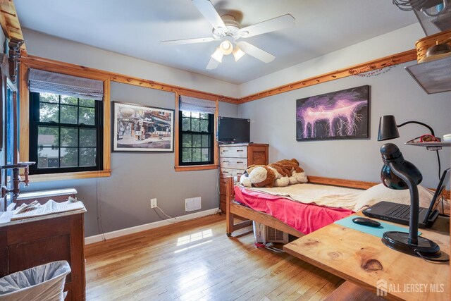 2 Kerry Ct, Old Bridge, NJ 08857 - bedroom featuring multiple windows, hardwood / wood-style floors, and ceiling fan
