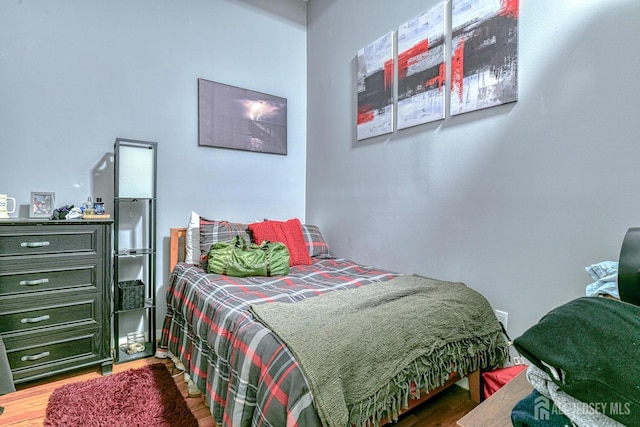 bedroom featuring hardwood / wood-style floors