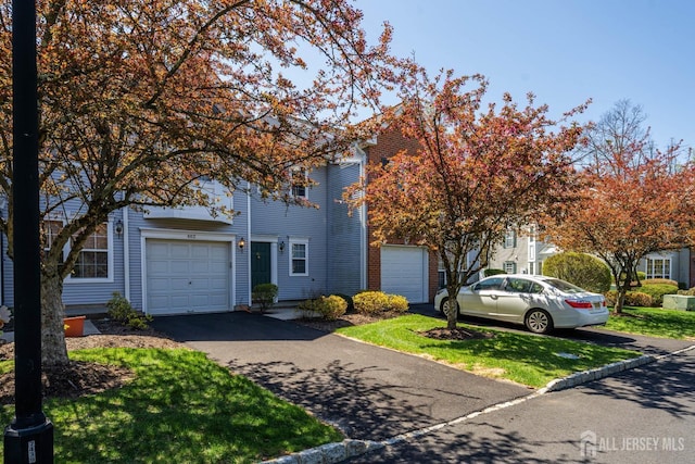 402 Canterbury Way S, Brunswick, NJ 08540 - view of front of house featuring a garage and driveway