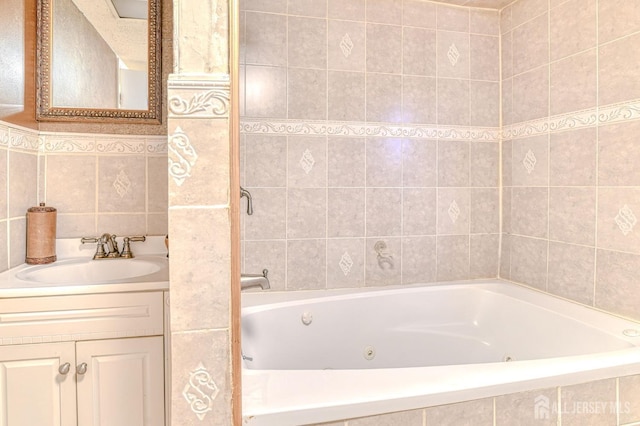 full bathroom with tile walls, vanity, and decorative backsplash