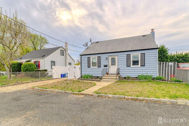 9 Macarthur Ave, Spotswood, NJ 08884 - view of front of property with a gate