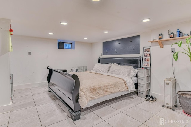 bedroom with recessed lighting, light tile patterned floors, and baseboards