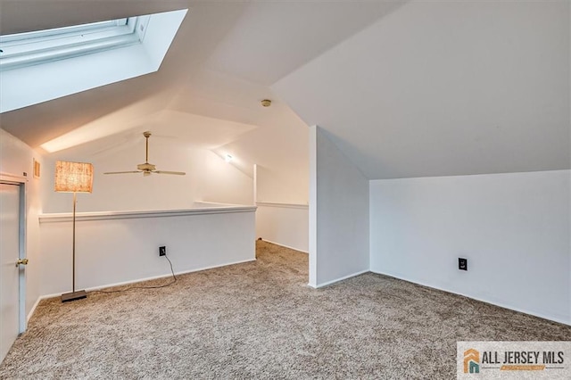 bonus room featuring carpet flooring, ceiling fan, and vaulted ceiling