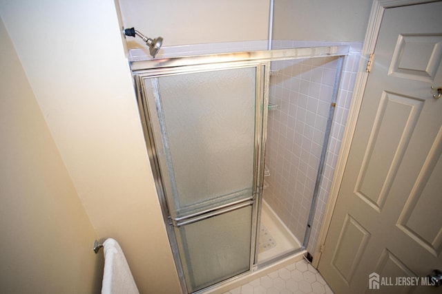 bathroom with an enclosed shower