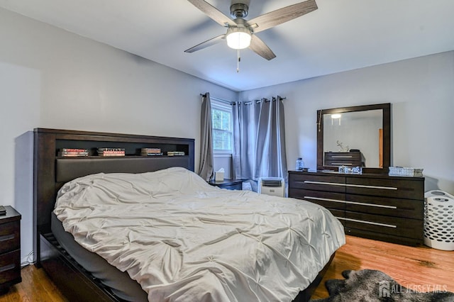 1056 Kearney Dr, North Brunswick, NJ 08902 - bedroom with wood finished floors and a ceiling fan