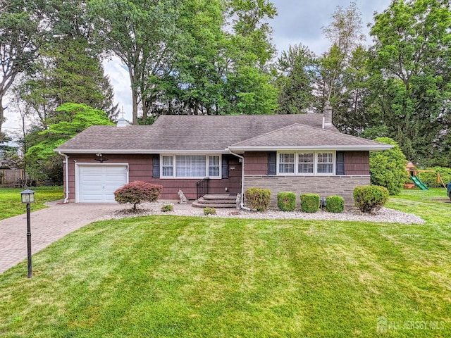 1056 Kearney Dr, North Brunswick, NJ 08902 - single story home with a chimney, an attached garage, driveway, a front lawn, and a shingled roof