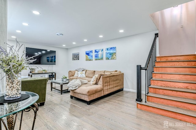 1056 Kearney Dr, North Brunswick, NJ 08902 - living area with recessed lighting, wood finished floors, and stairs