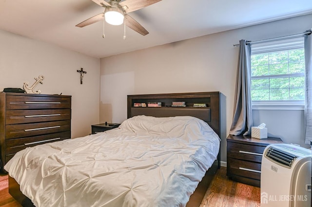 1056 Kearney Dr, North Brunswick, NJ 08902 - bedroom with wood finished floors and ceiling fan