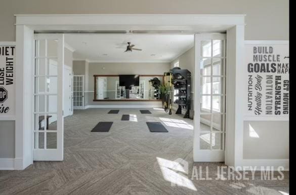 interior space featuring french doors and carpet flooring