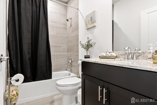 full bath featuring vanity, toilet, and shower / bath combination with curtain