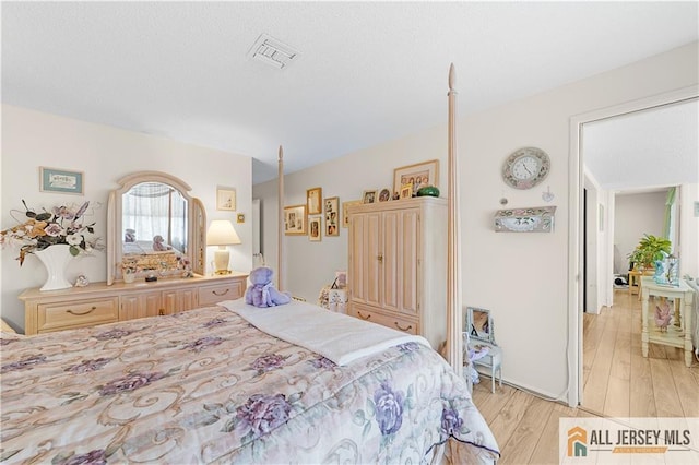 180 Mimosa Plz Unit 180A, Monroe, NJ 08831 - bedroom with light wood-style floors