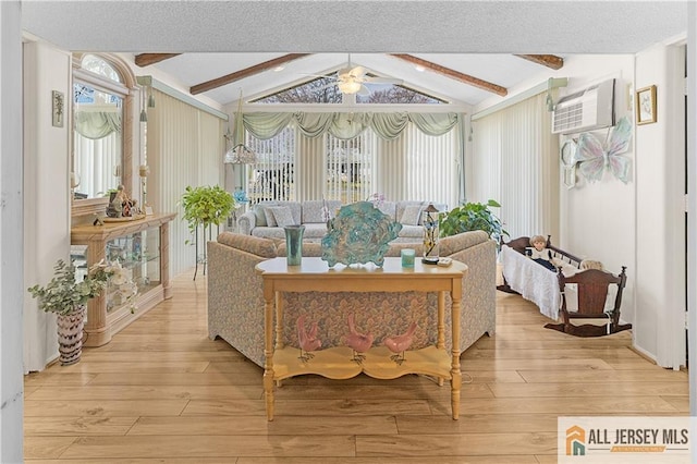 180 Mimosa Plz Unit 180A, Monroe, NJ 08831 - living room with ceiling fan, light wood finished floors, and a wall unit AC