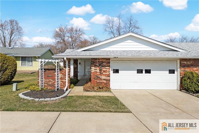 180 Mimosa Plz Unit 180A, Monroe, NJ 08831 - ranch-style home featuring brick siding, an attached garage, concrete driveway, and a front yard