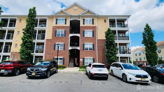 548 E Celebration Way E, South Plainfield, NJ 07080 - view of apartment building / complex with uncovered parking