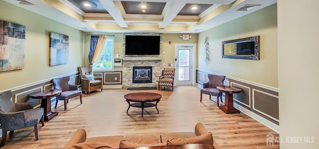 548 E Celebration Way E, South Plainfield, NJ 07080 - living area with beam ceiling, crown molding, a stone fireplace, wood finished floors, and coffered ceiling