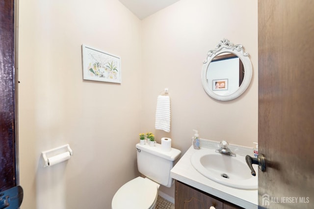 77 Highview Dr, Woodbridge Proper, NJ 07095 - bathroom with toilet, vanity, and tile patterned floors