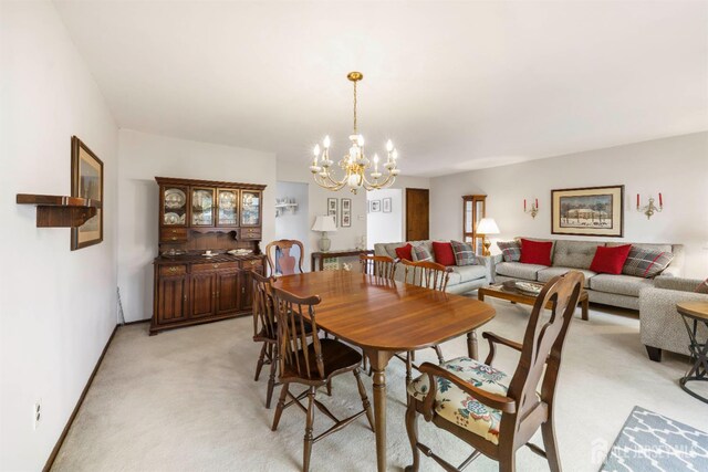 77 Highview Dr, Woodbridge Proper, NJ 07095 - dining space with a chandelier and light carpet