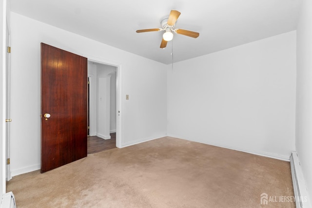 43 Jensen Ave, Fords, NJ 08863 - unfurnished room with baseboards, a baseboard radiator, a ceiling fan, and light carpet