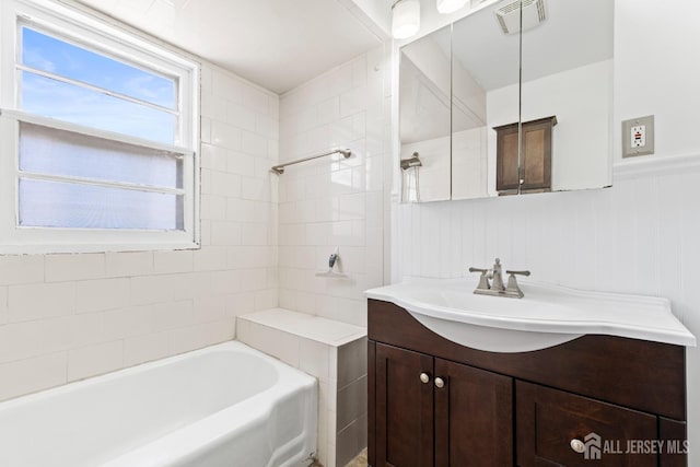 43 Jensen Ave, Fords, NJ 08863 - full bath featuring a bathing tub, walk in shower, visible vents, and vanity