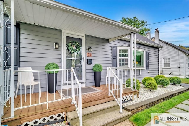 27 Collins Rd, Hamilton, NJ 08619 - view of exterior entry with covered porch