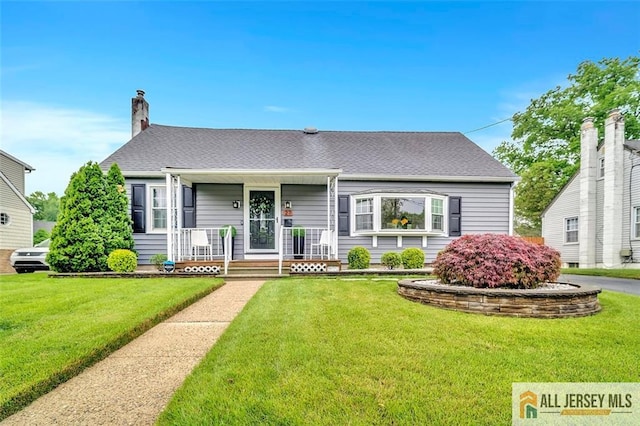 27 Collins Rd, Hamilton, NJ 08619 - view of front of property featuring a porch, a front lawn, a chimney, and roof with shingles
