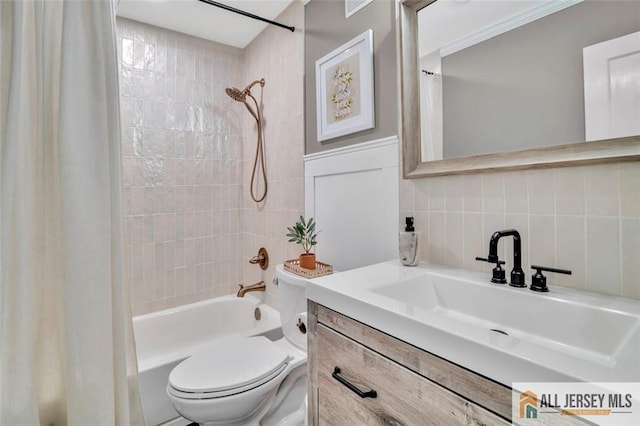 27 Collins Rd, Hamilton, NJ 08619 - full bath featuring shower / bath combo, vanity, decorative backsplash, toilet, and tile walls