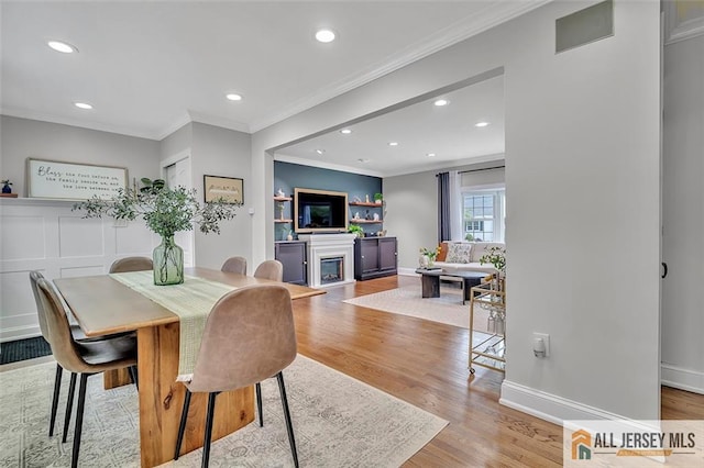27 Collins Rd, Hamilton, NJ 08619 - dining area featuring ornamental molding, recessed lighting, wood finished floors, and baseboards