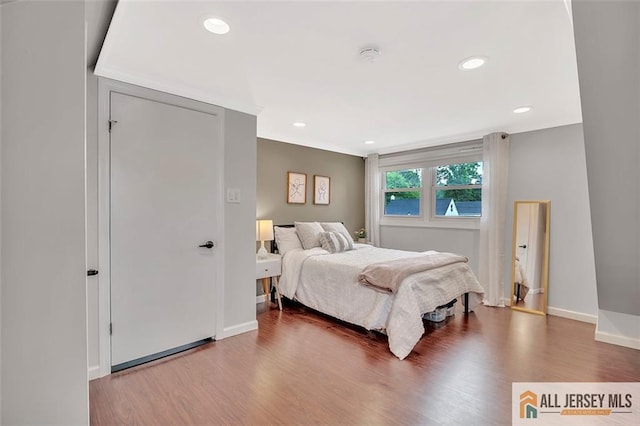 27 Collins Rd, Hamilton, NJ 08619 - bedroom with wood finished floors, baseboards, and recessed lighting