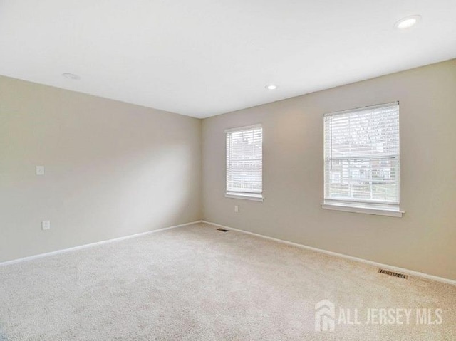 308 Pewter Ct, Old Bridge, NJ 08857 - carpeted spare room with healthy amount of natural light, baseboards, and recessed lighting