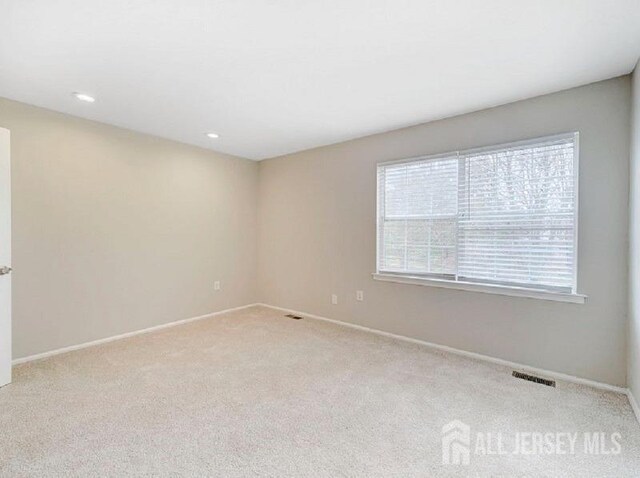 308 Pewter Ct, Old Bridge, NJ 08857 - carpeted empty room featuring baseboards and recessed lighting