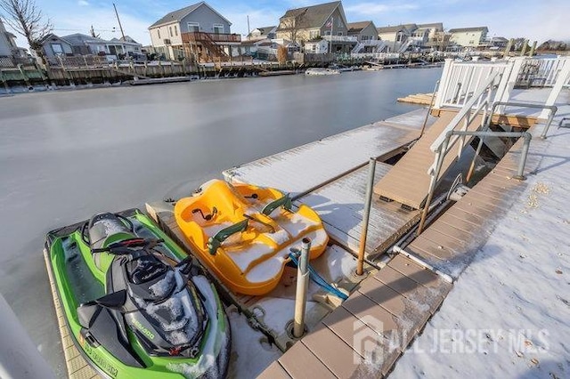 view of dock with a water view