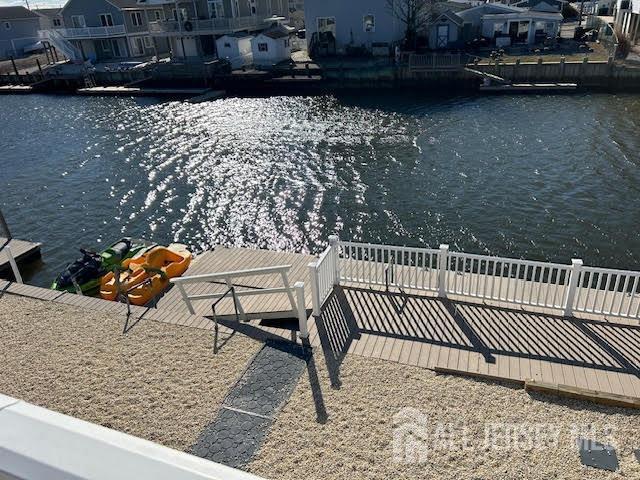 dock area featuring a water view