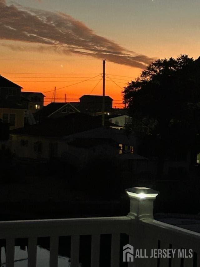 view of yard at dusk