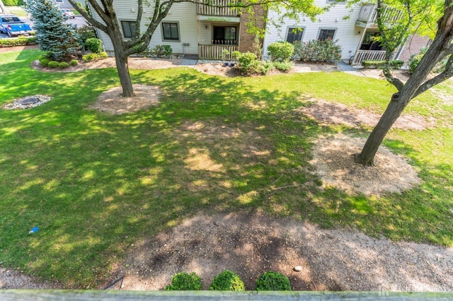 view of yard with covered porch