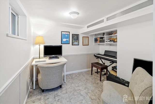 office space with wainscoting