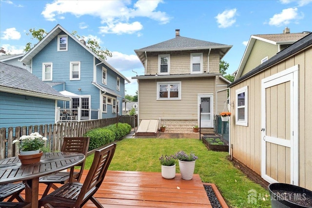328 Becker St, Highland Park, NJ 08904 - back of house featuring a deck and a chimney