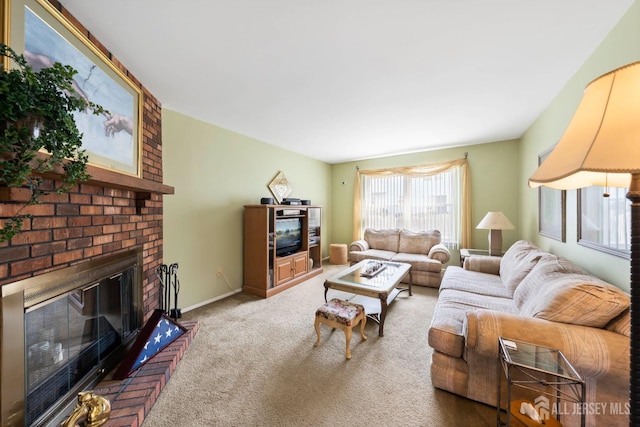 carpeted living room with a fireplace and baseboards