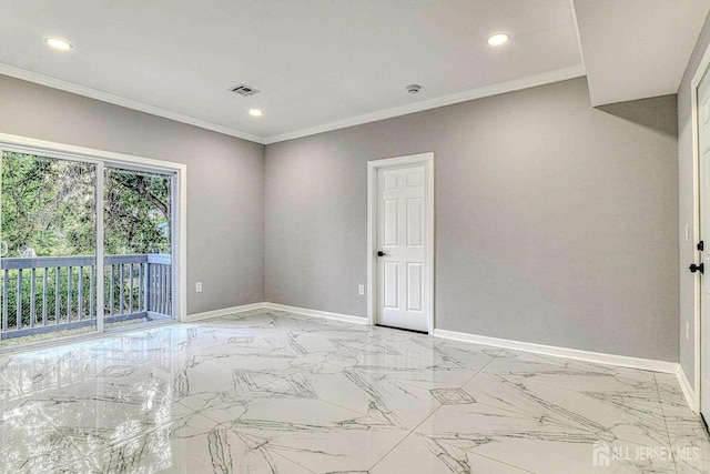 unfurnished room featuring crown molding